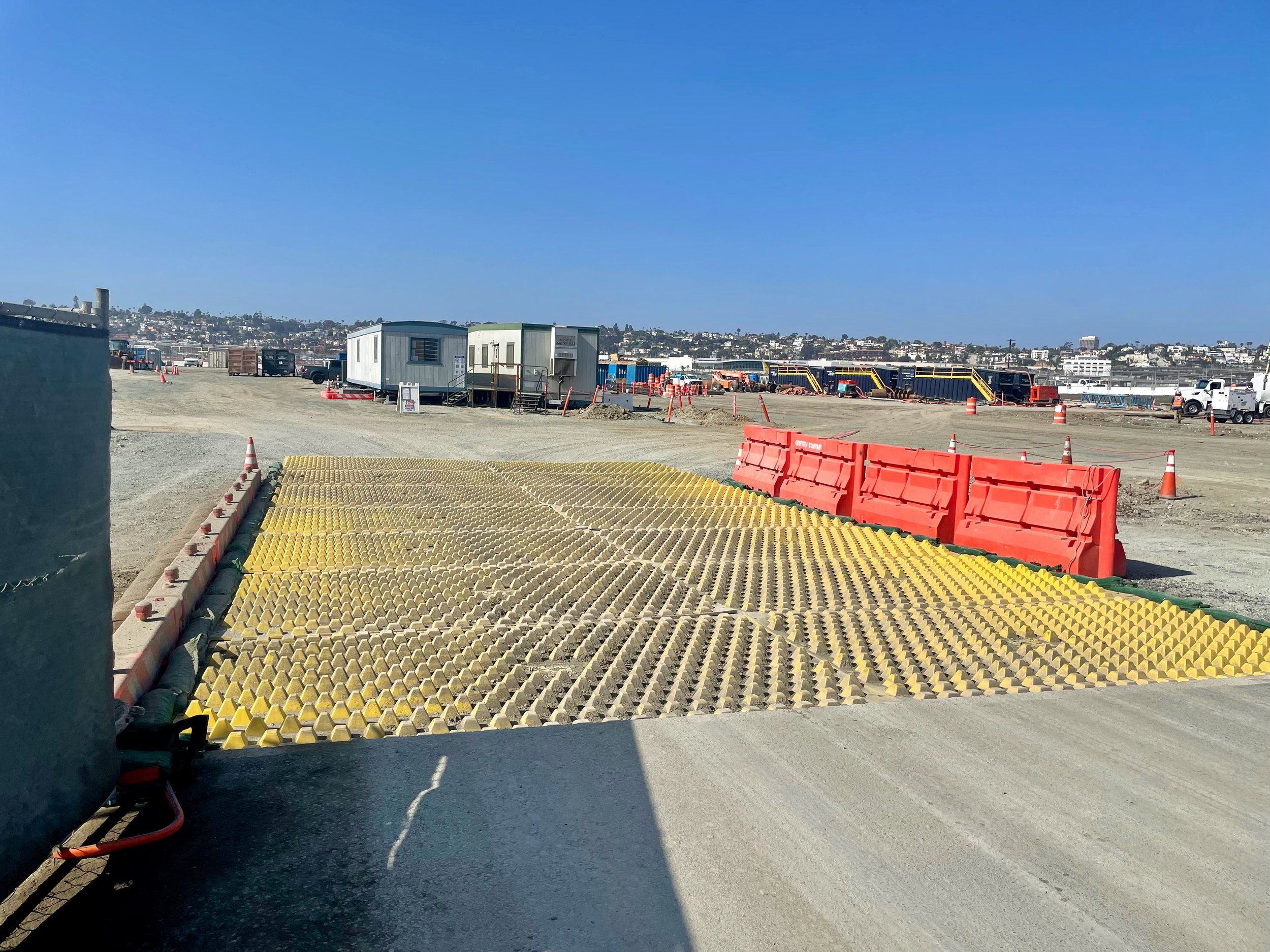 Construction Track Out Controls San Diego New T1 Improvement Project Construction Entrance FODS Reusable Trackout Control Mats Two Lane Construction Entrance Exit TC-1 Wide Turn Radius