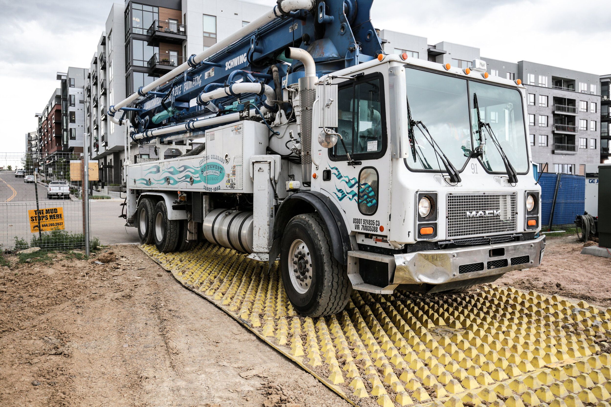 FODS Construction Entrance Construction Exit Installed In Colorado With Truck Driving Into The Jobsite Trackout Control System BMP Construction Vehicle Tracking Controls BMP Soil Tracking Prevention Device VTC TC-1