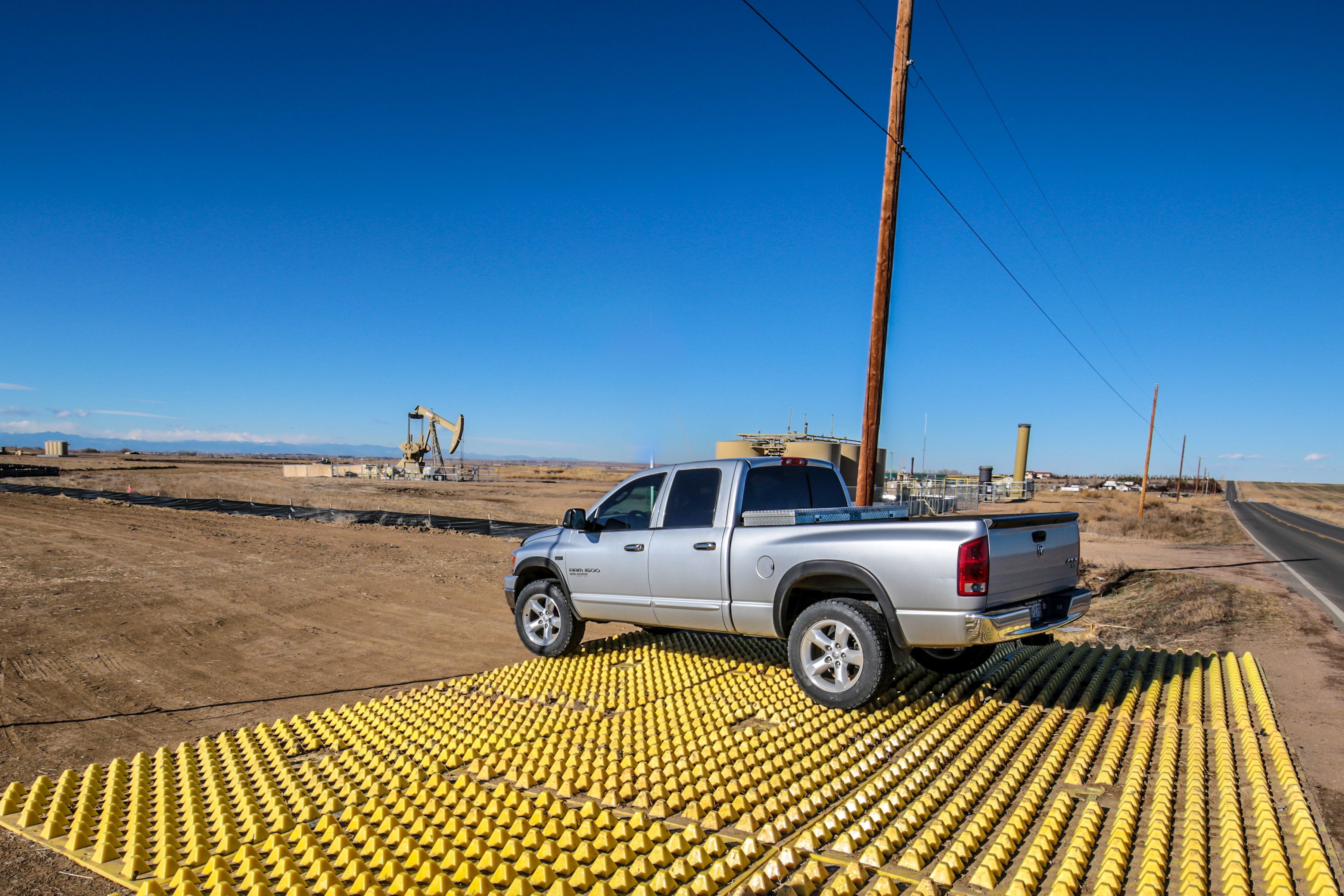 FODS Installed On Oil Field Project As Construction Entrance Construction Exit Vehicle Tracking Controls BMP TC-1 VTC Trackout Tracking Control Wheel Wash Rumble Grid