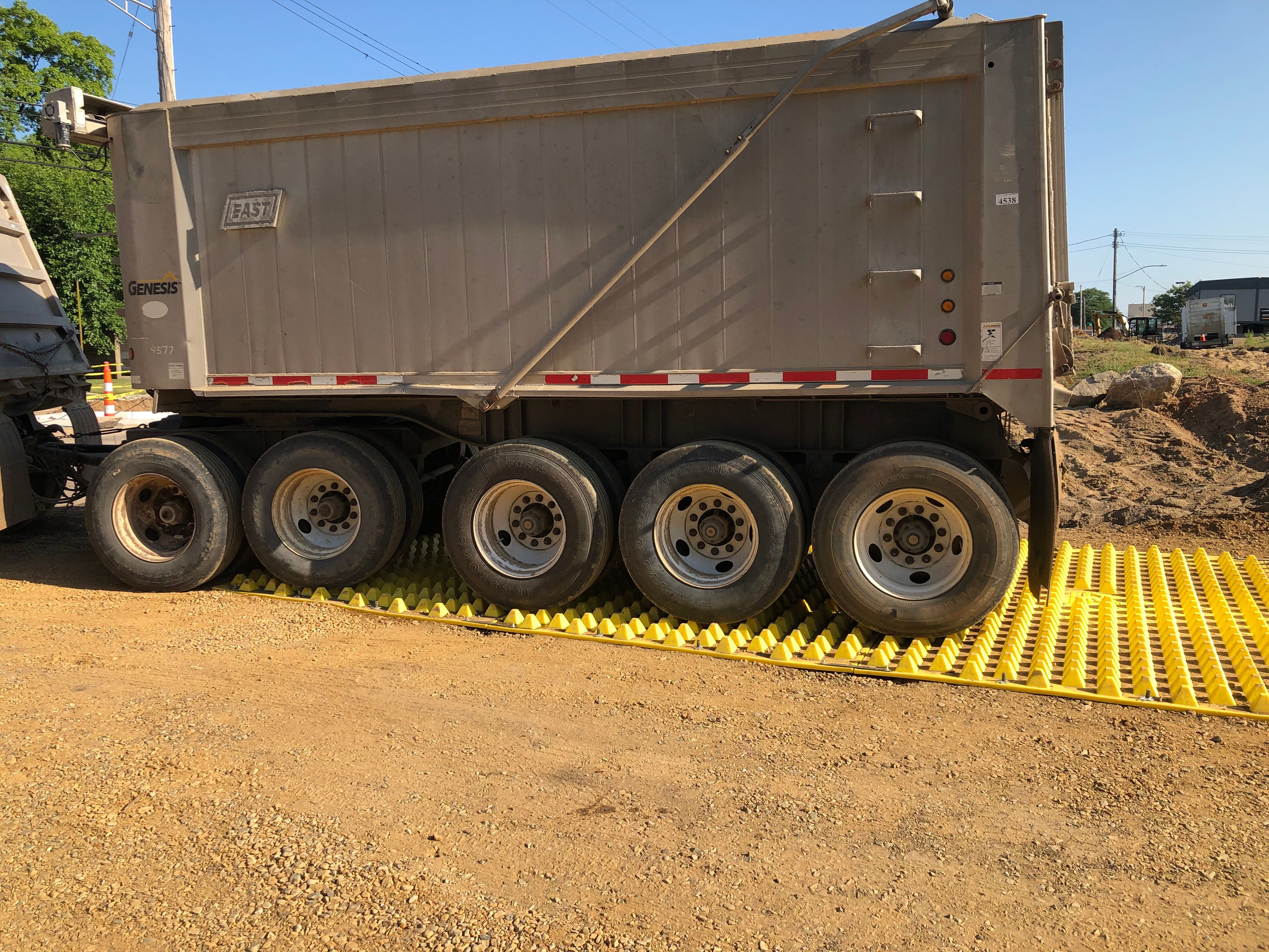 FODS Trackout Control Mats Rockless Reusable Construction Entrance SWPPP Compliant Red Cedar Development Michigan Heavy Equipment Durable Cost Effective