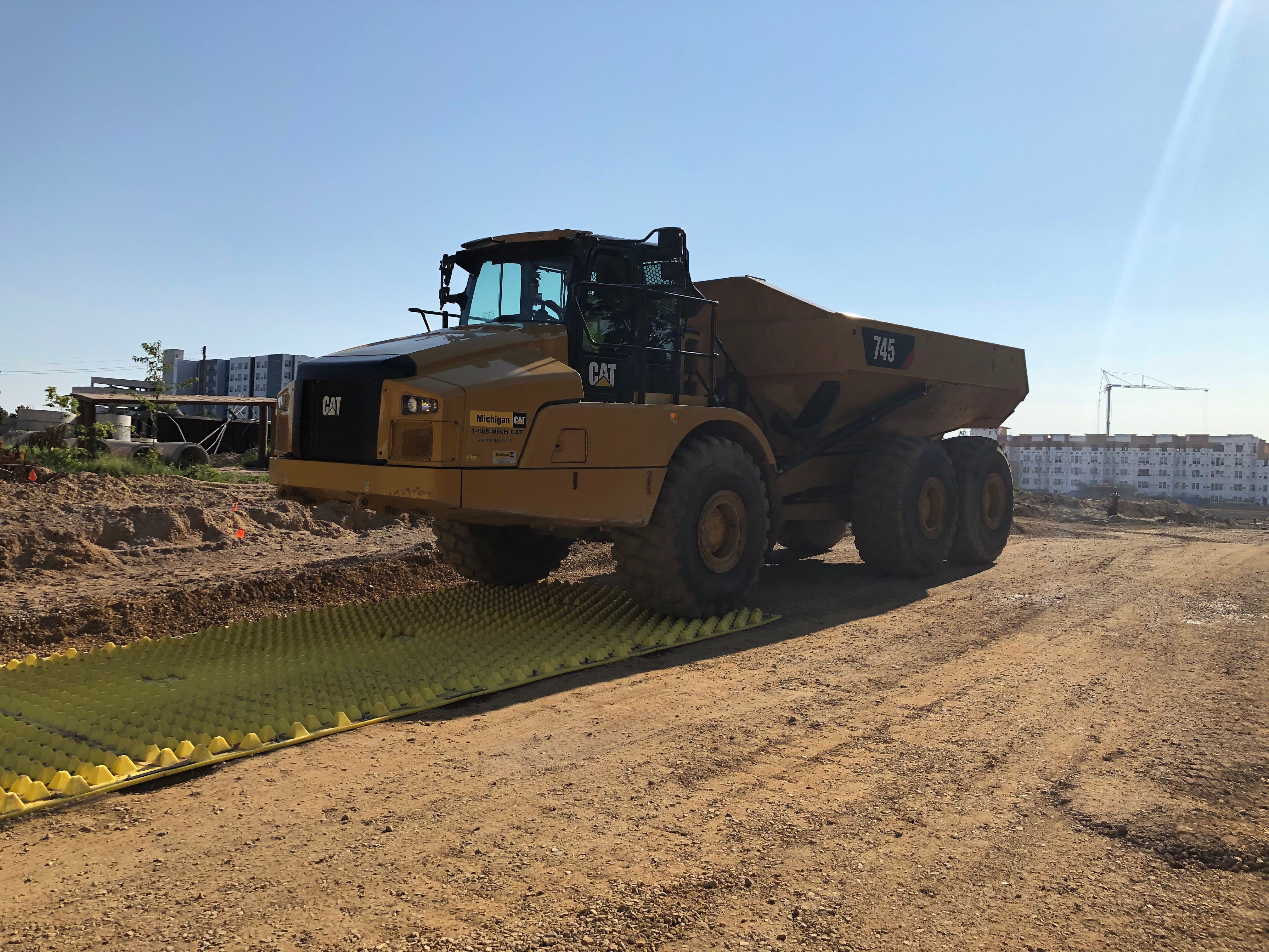 FODS Trackout Control Mats Rockless Reusable Construction Entrance SWPPP Compliant Red Cedar Development Michigan Heavy Equipment Durable Cost Effective