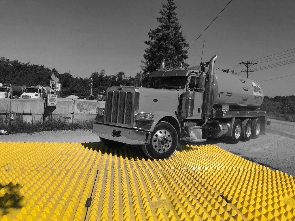 Marcellus Shale Formation Fracking Trackout Control Mat System Stabilized Construction Entrance Solution BMP Stormwater Control Erosion And Sediment Control System