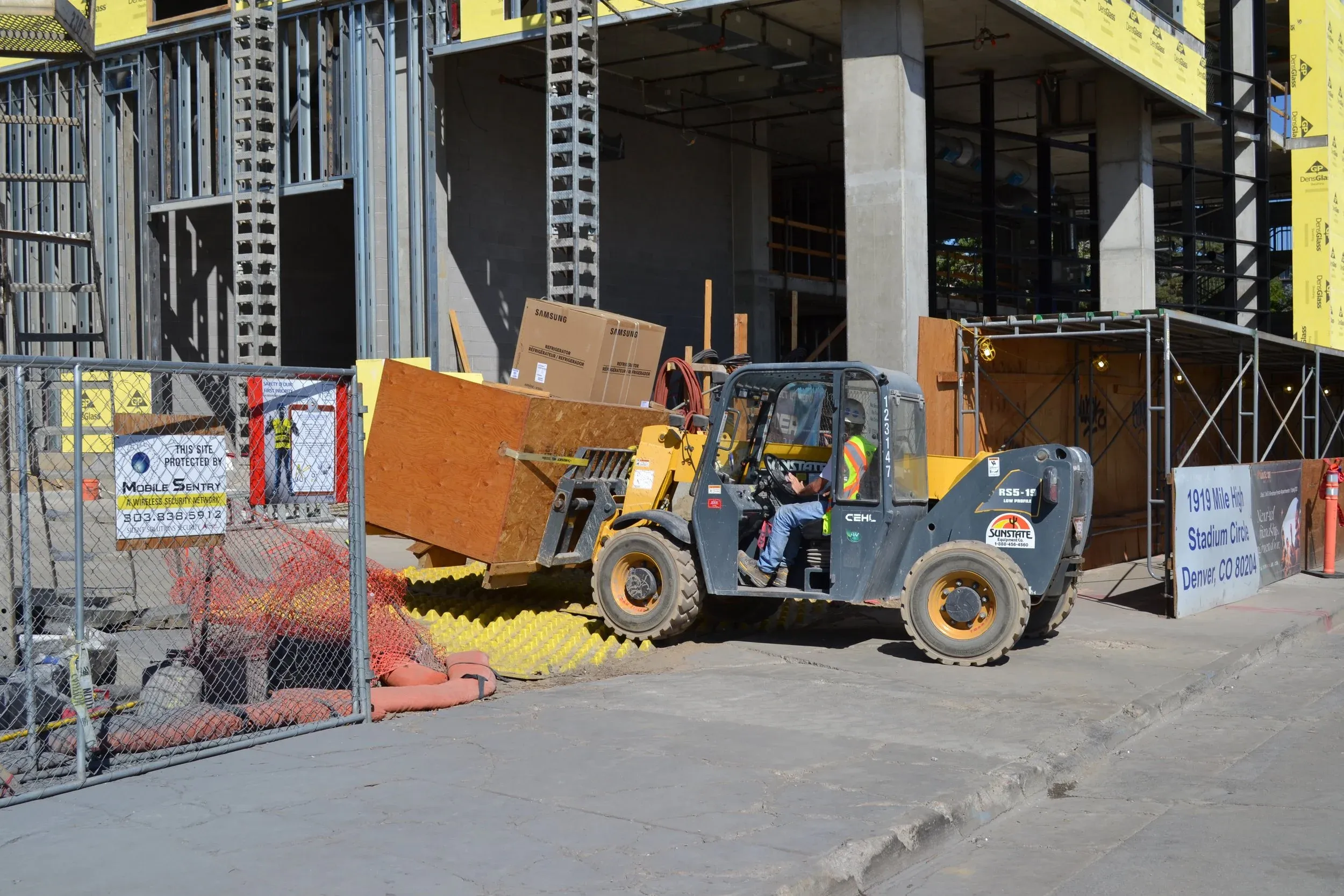 FODS Installed At Entrance Of Mile High With Forklift Loading Materials
